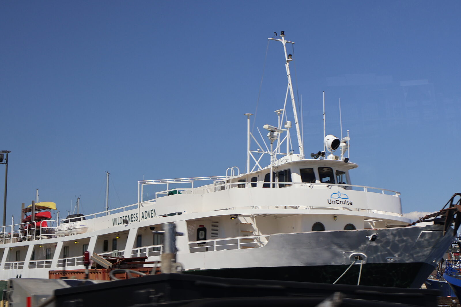 A small expedition ship docked in Alaska