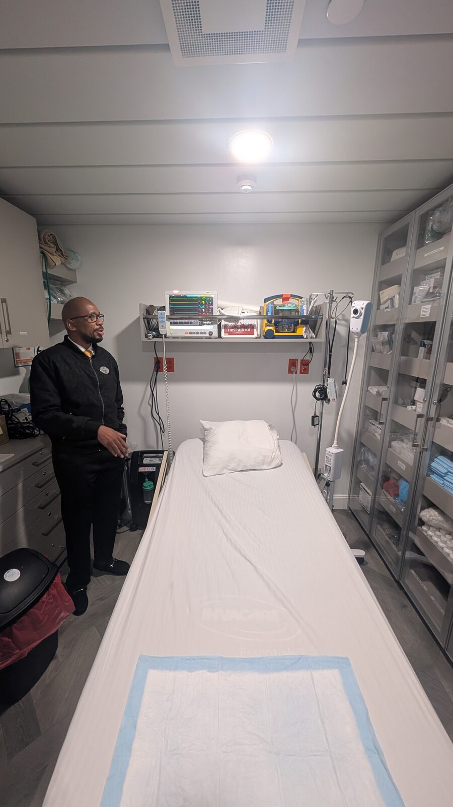 The medical center on Victory II with an exam bed and supply cabinets